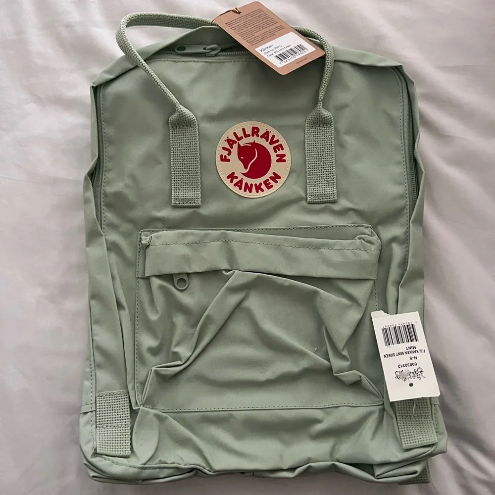 Fjallraven Kanken Backpack in Sage Green with Red Logo